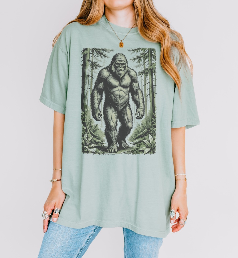 Bigfoot Stalking Through the Conifer Forest Cryptid Shirt
